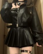 Korean-style vegan leather two piece set featuring a jacket and skirt.