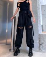 Black Korean style cargo pants with multiple pockets and straps.
