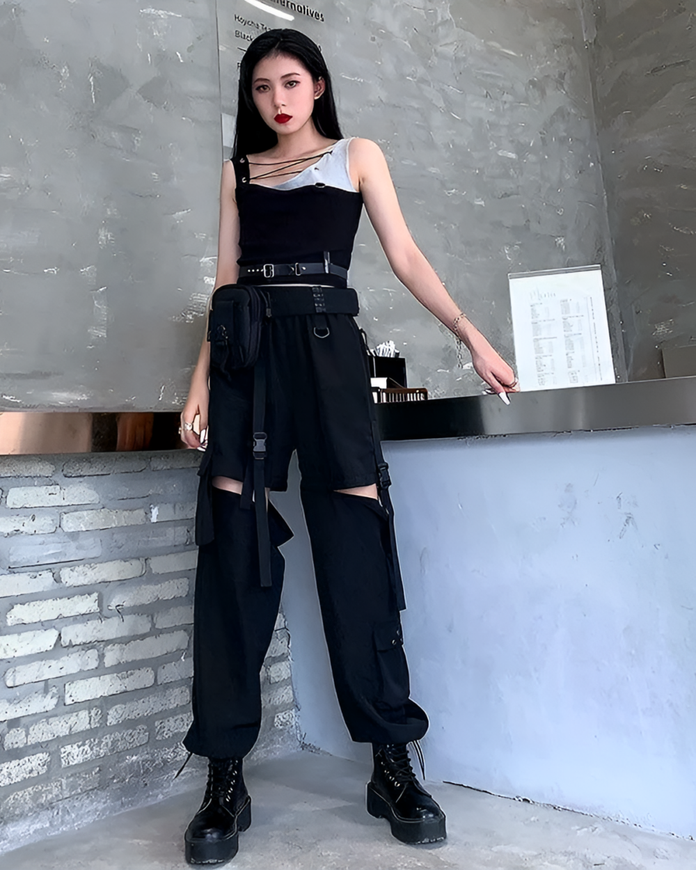 Woman wearing Korean style cargo pants with a detachable belt and straps.