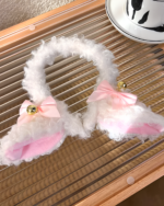 Pink and white lamb ears headband with bells, soft and fluffy. A cute accessory.