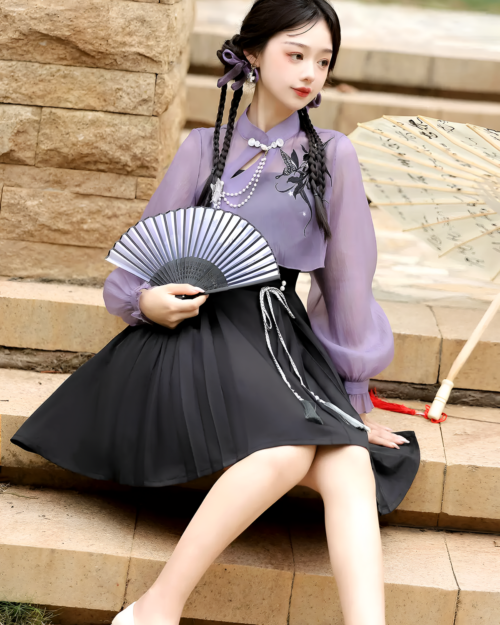 Woman wearing a Lavender Set - Qi Lolita outfit, including a blouse, skirt, and fan.