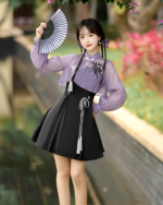 Model wearing a Lavender Set - Qi Lolita outfit, featuring a purple blouse and skirt with black accents.