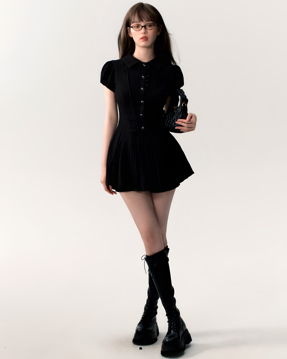 Black Literature Girl Mini Dress, a button-up academic aesthetic dress worn by a model.