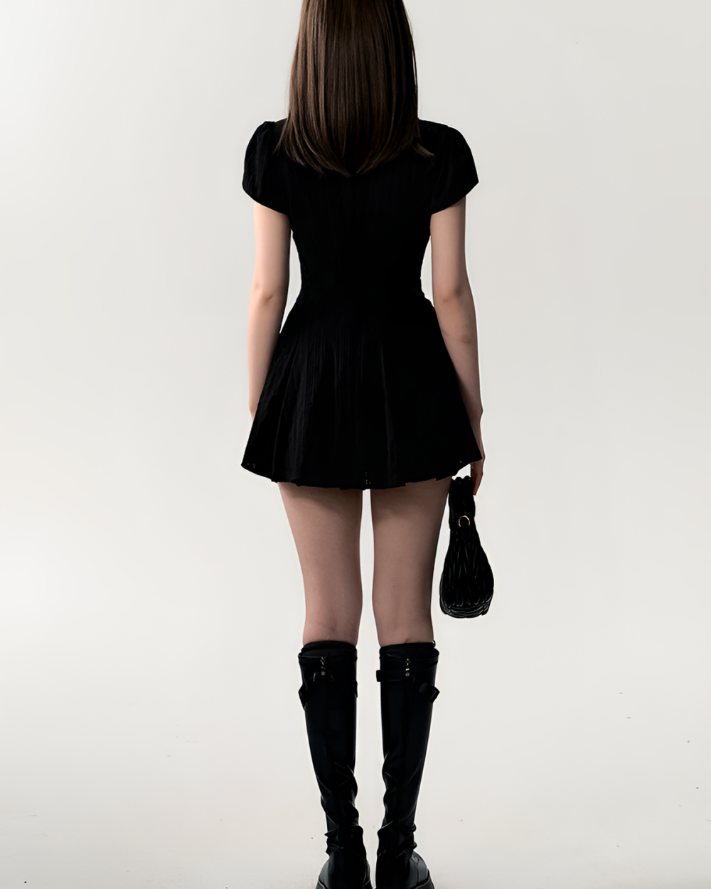 Black Literature Girl Mini Dress, a short academic aesthetic dress, worn by a model.