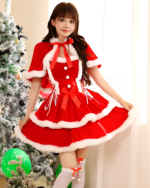 Girl wearing a red Little Red Riding Hood Dress with white faux fur trim, standing near a Christmas tree.