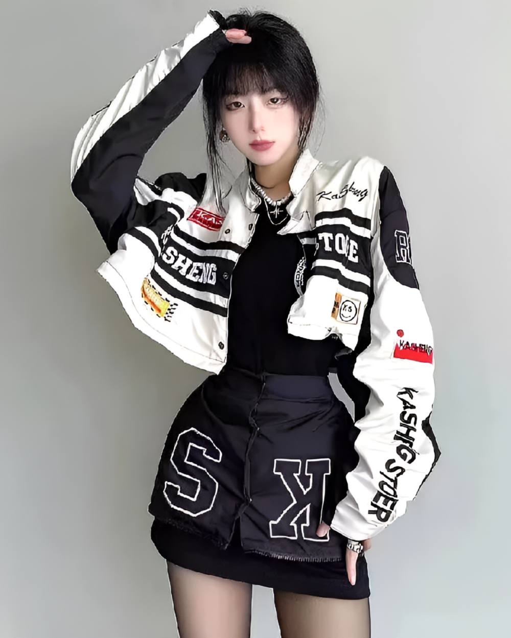 Woman wearing a Long Sleeve Racing Cardigan with graphic details.