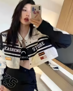 Person wearing a Long Sleeve Racing Cardigan and a jacket.