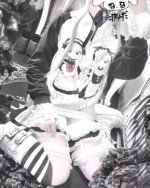 Long sleeve t-shirt featuring a maid print design, showcasing a stylish outfit.