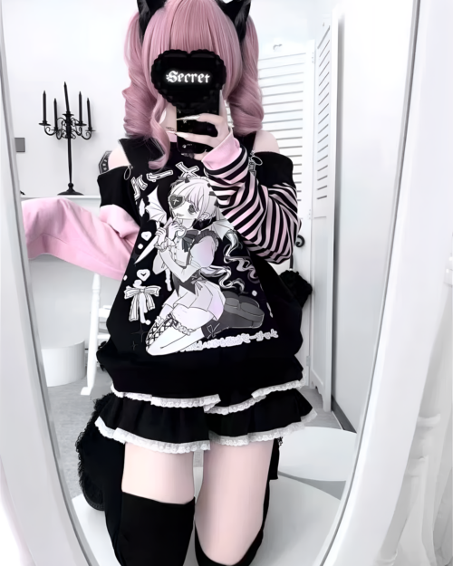 Model wearing a Long Sleeved Stripped T-Shirt - Yami Kawaii with a character print.