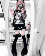 Model wearing a yami kawaii aesthetic Long Sleeved Stripped T-Shirt with layered clothing and accessories.