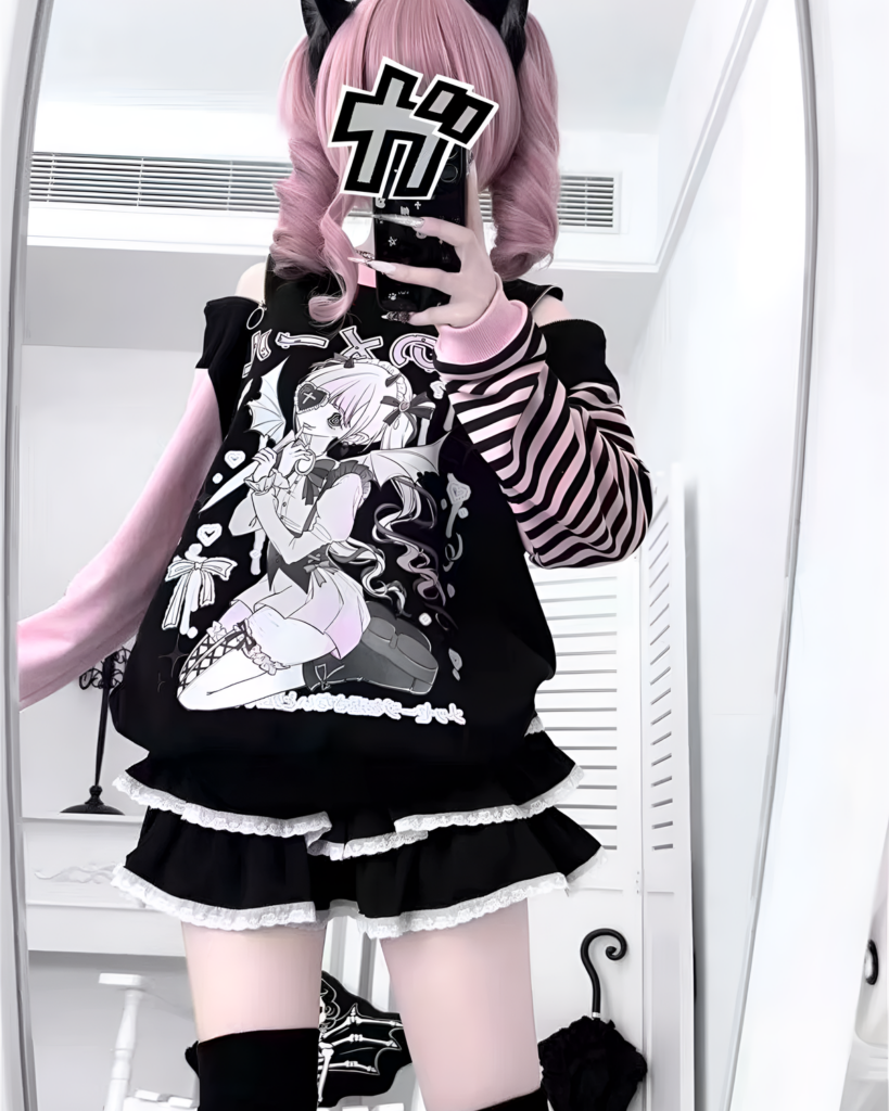 Model wearing a yami kawaii aesthetic long sleeved striped t-shirt with a gothic print.