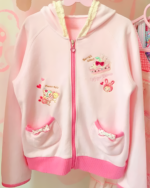 Pink Mezzo Piano hoodie with a Yume Kawaii aesthetic, featuring embroidered details and a zip-up front.