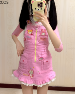 A woman wearing a pink Mezzo Piano dress with bear and bunny details. Jojifuku aesthetic style.