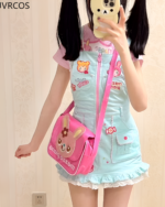 Woman modeling a light blue Mezzo Piano dress with pink accents and a matching bag. Jojifuku aesthetic style.