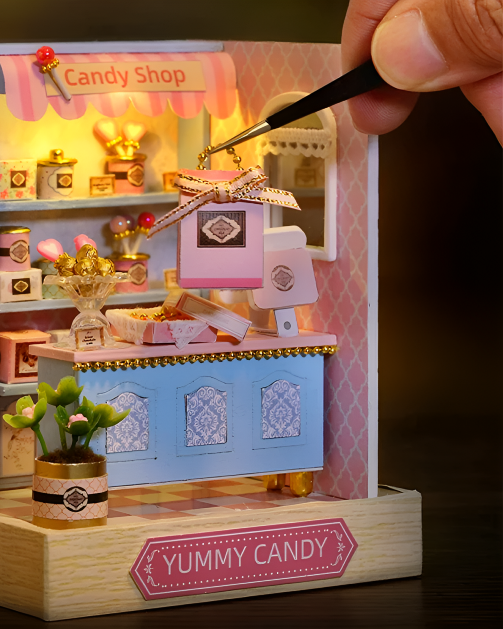 Close-up of a Miniature DIY Doll House featuring a Candy Shop display.