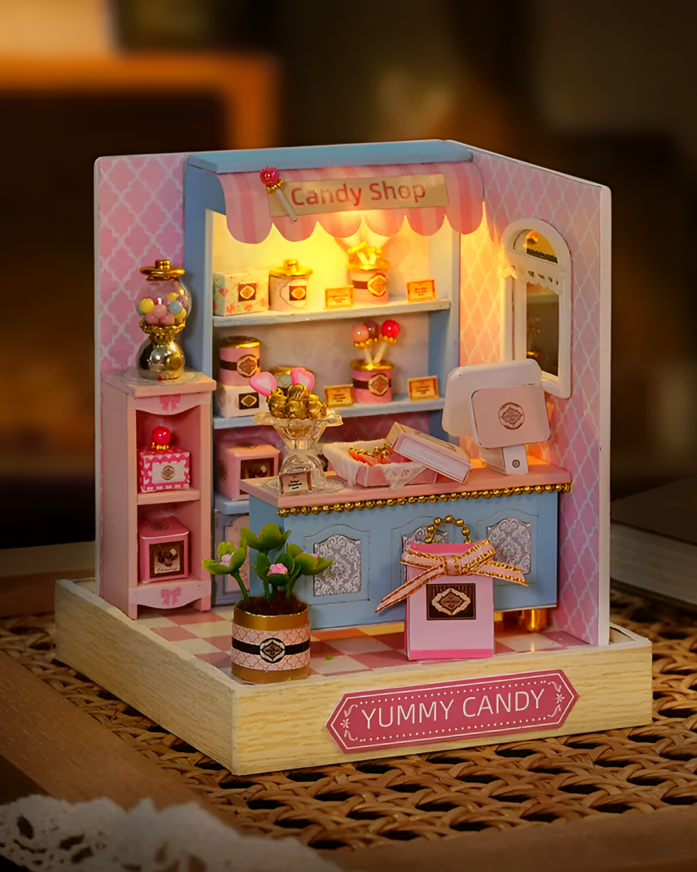 Miniature DIY Doll House featuring a candy shop with details and lighting.