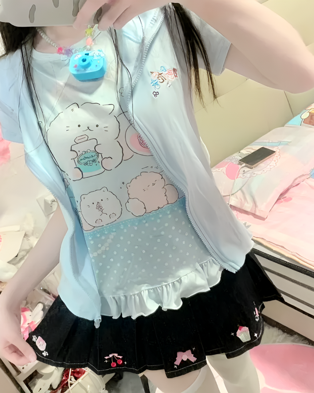 Person wearing a Necolon T-Shirt featuring Yume Kawaii aesthetic designs.