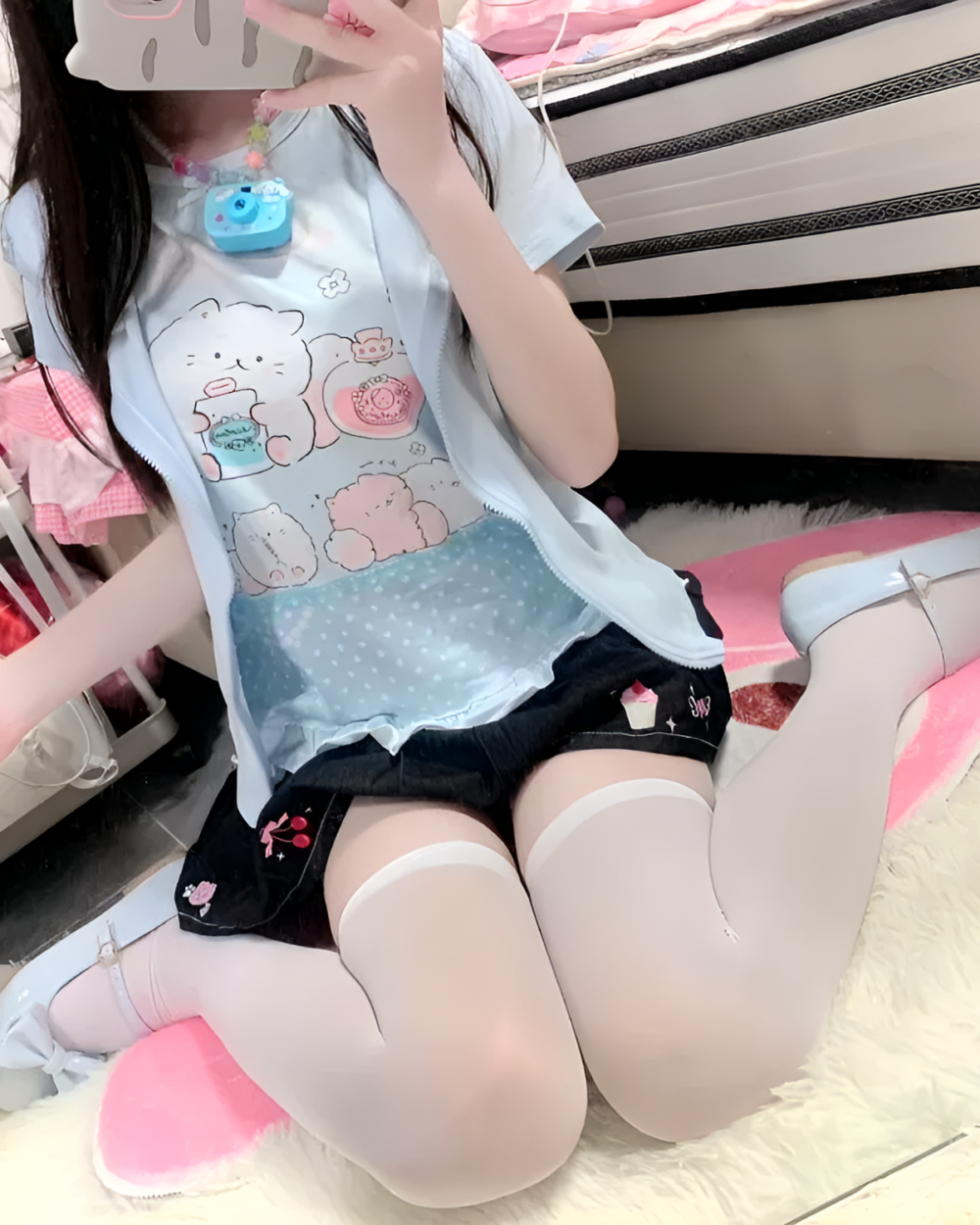 Person wearing a Necolon T-Shirt featuring a kawaii aesthetic design.