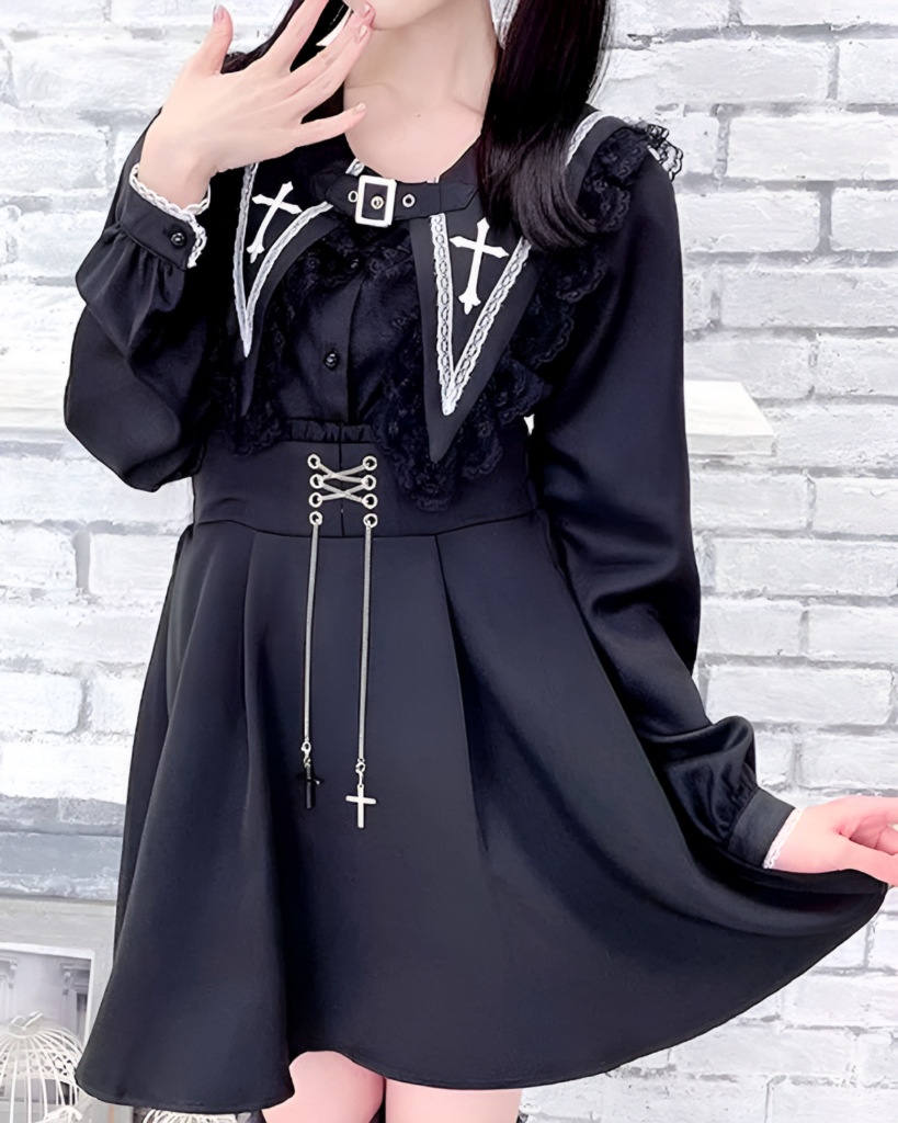 Black long-sleeve Jirai Kei blouse with a high collar, lace details, and a cross pendant. Features a flared silhouette.