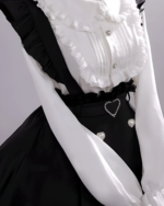 Noir Pearl Pinafore Coord showcasing a black and white design with pearl details. This outfit embodies the Jirai Kei aesthetic.