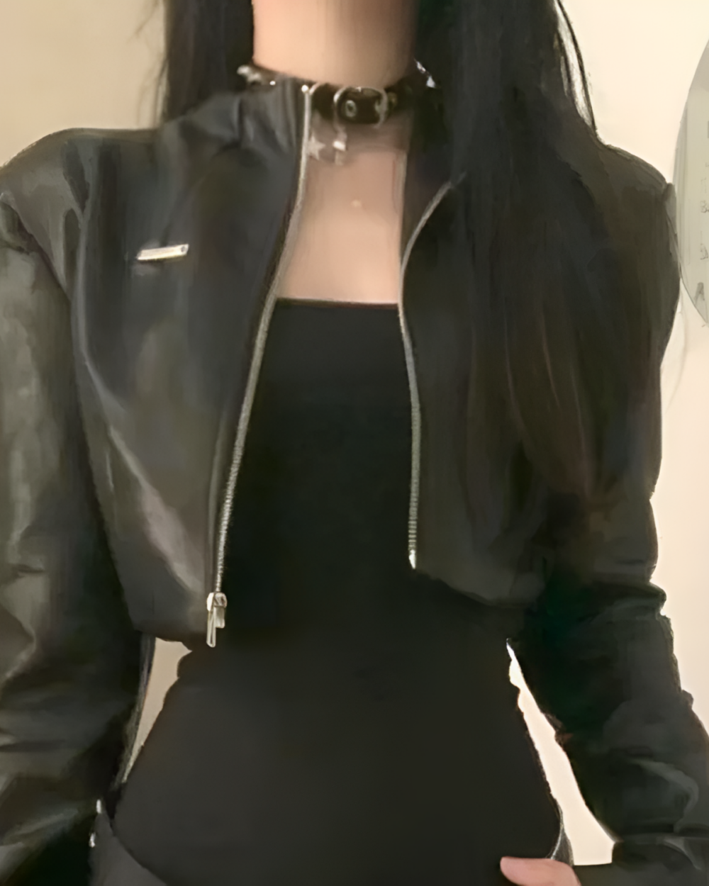 Woman wearing a black Noir Shadow Crop Moto Jacket, an e-girl crop jacket. Zippered front and long sleeves.