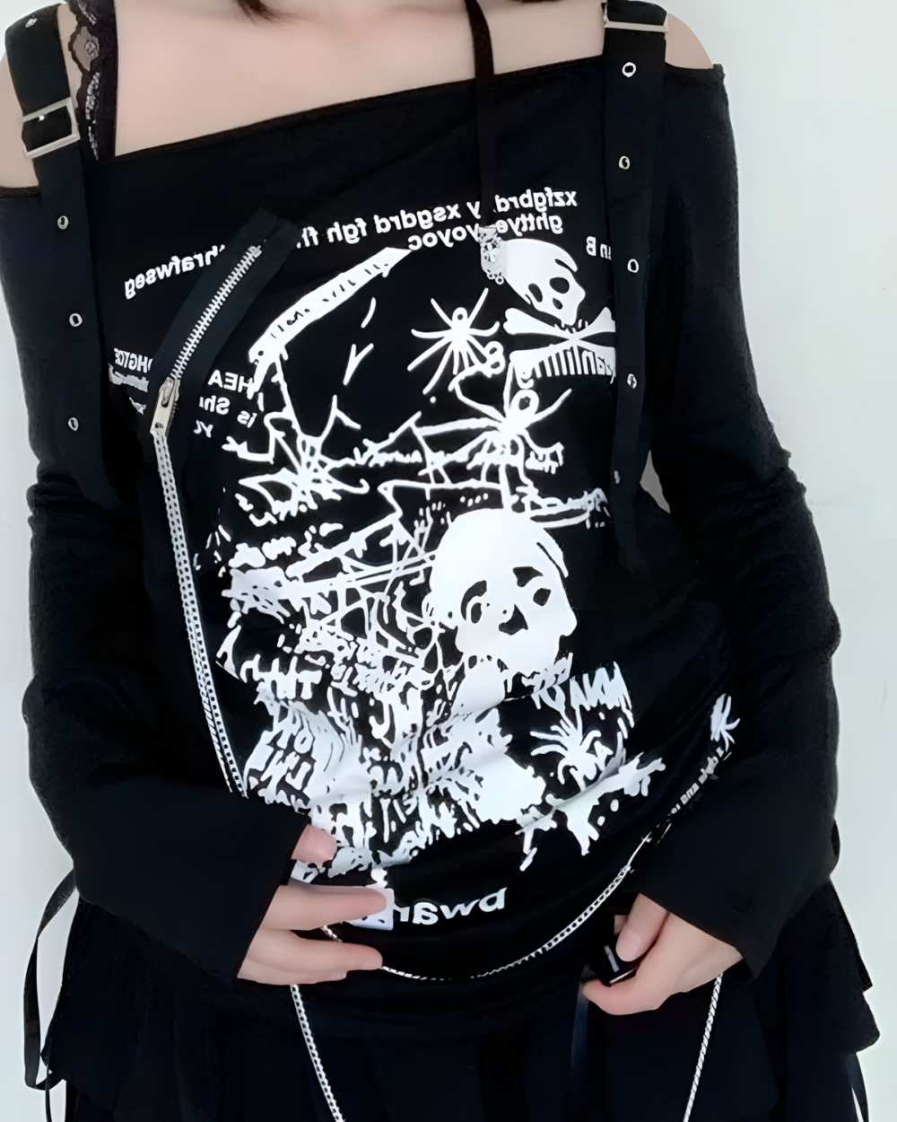 Black Nu-Goth sweater featuring a skull and floral print, off-shoulder design with zip details.