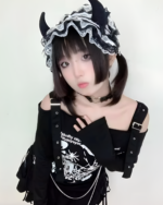 Black Nu-Goth sweater with lace headband and choker detailing.