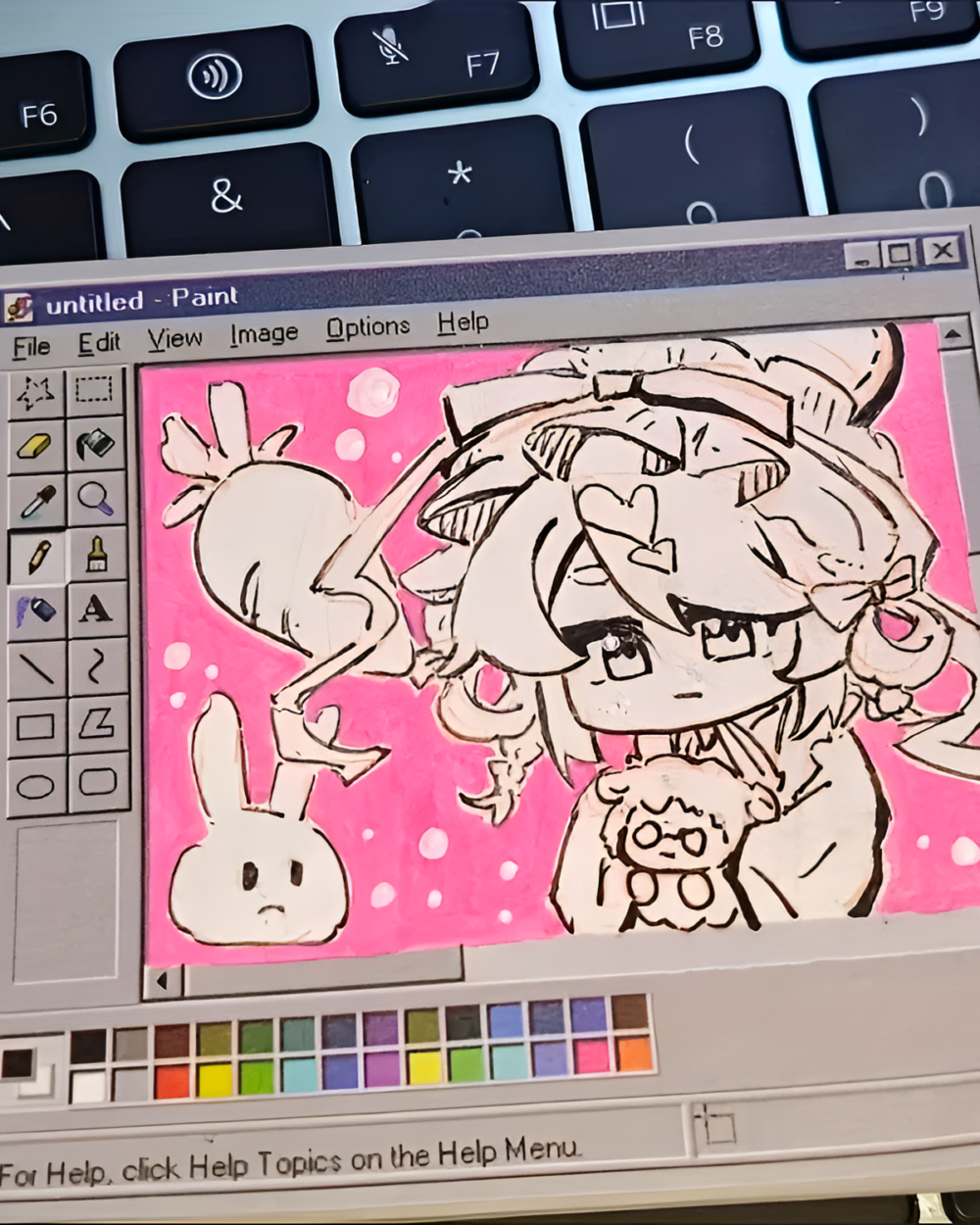 Digital art created with Paint Sticky Notes software shown on a laptop screen.