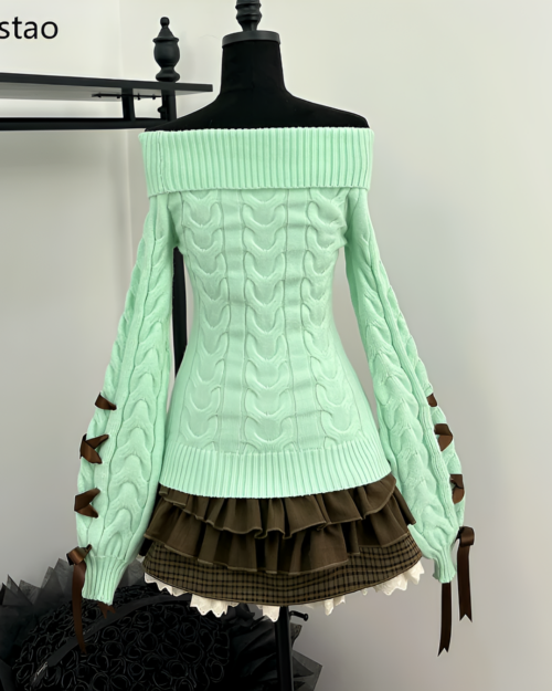 Mint knit set: Pale green off-the-shoulder sweater with ruffled brown skirt and lace detailing.