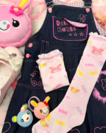 Pink Lolita socks displayed with a dollhouse denim outfit and other accessories.