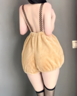 Brown plushie bear pajamas with polka dots and back straps.