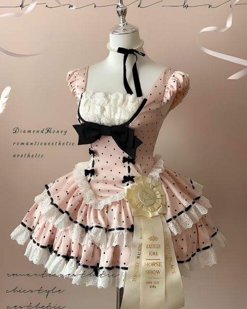 Polka dotted Hime Lolita dress with ruffled details and a black ribbon. A pink and white romantic aesthetic dress.