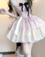 Pink polka dot Hime Lolita dress with ruffled details and a bow. Features a layered skirt and delicate straps.