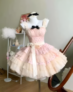 Polka dot Hime Lolita dress with ruffled tiers and a sweetheart neckline displayed on a mannequin.
