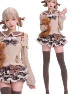 A young woman wearing a Preppy Sweet Lolita Set - Dollette Aesthetic, featuring a sweater, skirt, and teddy bear.
