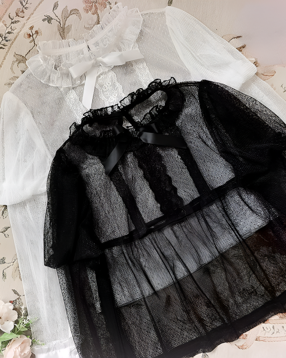 Retro-Style Blouses - Hime Lolita Aesthetic product photo 1 Black and white Hime Lolita blouse with sheer mesh and lace details.