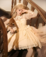 Model wearing a cream-colored Hime Lolita blouse with lace and ruffles on a staircase.