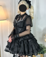 Black Hime Lolita blouse with lace details and puff sleeves.