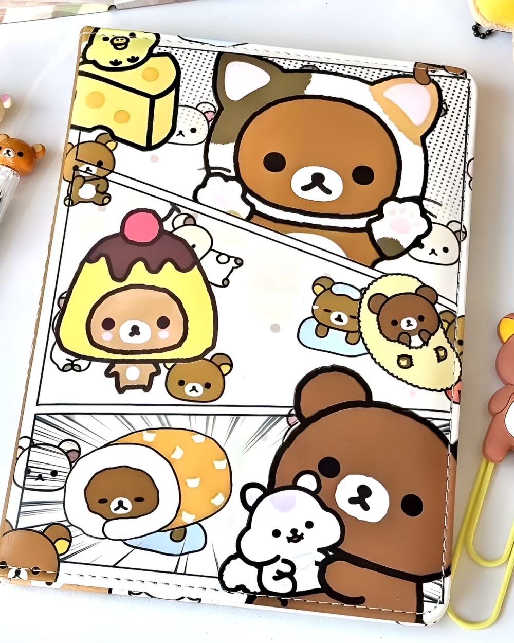 Rilakkuma notebook featuring Rilakkuma and friends illustrations on a lined page.