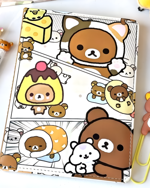Rilakkuma notebook featuring Rilakkuma and friends illustrations on a lined page.