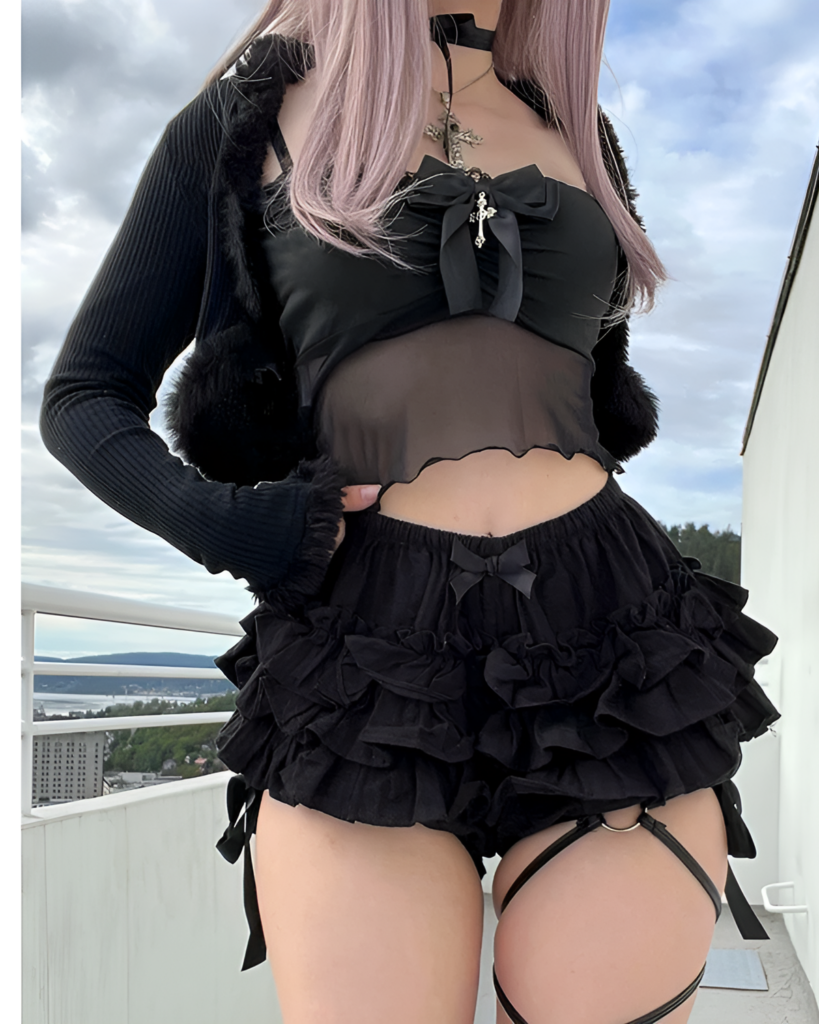 Woman modeling Ruffled Dark Bloomers with a black top, embodying the mall goth aesthetic fashion style.