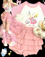Pink ruffled mini skirt paired with a Hello Kitty shirt and sneakers.