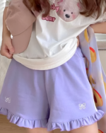 Purple ruffled Yume Kawaii shorts with a teddy bear print and bow details.