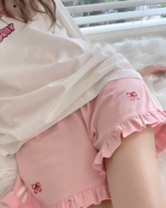 Pink Ruffled Shorts - Yume Kawaii shorts featuring a bow detail and ruffled hem.