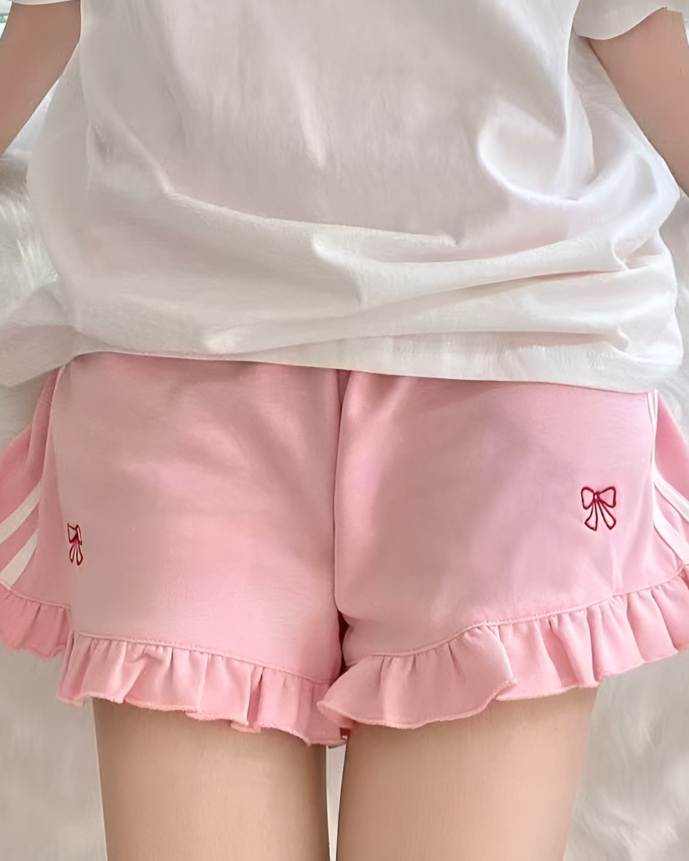 Pink Ruffled Shorts - Yume Kawaii shorts featuring a bow detail and ruffles.