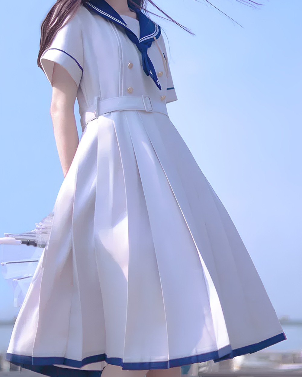 White sailor uniform dress (Nanchatte Seifuku) with blue trim, pleated skirt and belt.