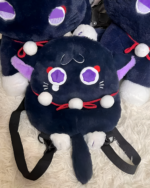 Close-up of ScaraMeow & XiaoMeow Backpack, a dark blue kawaii plush backpack with purple accents and white paw details.
