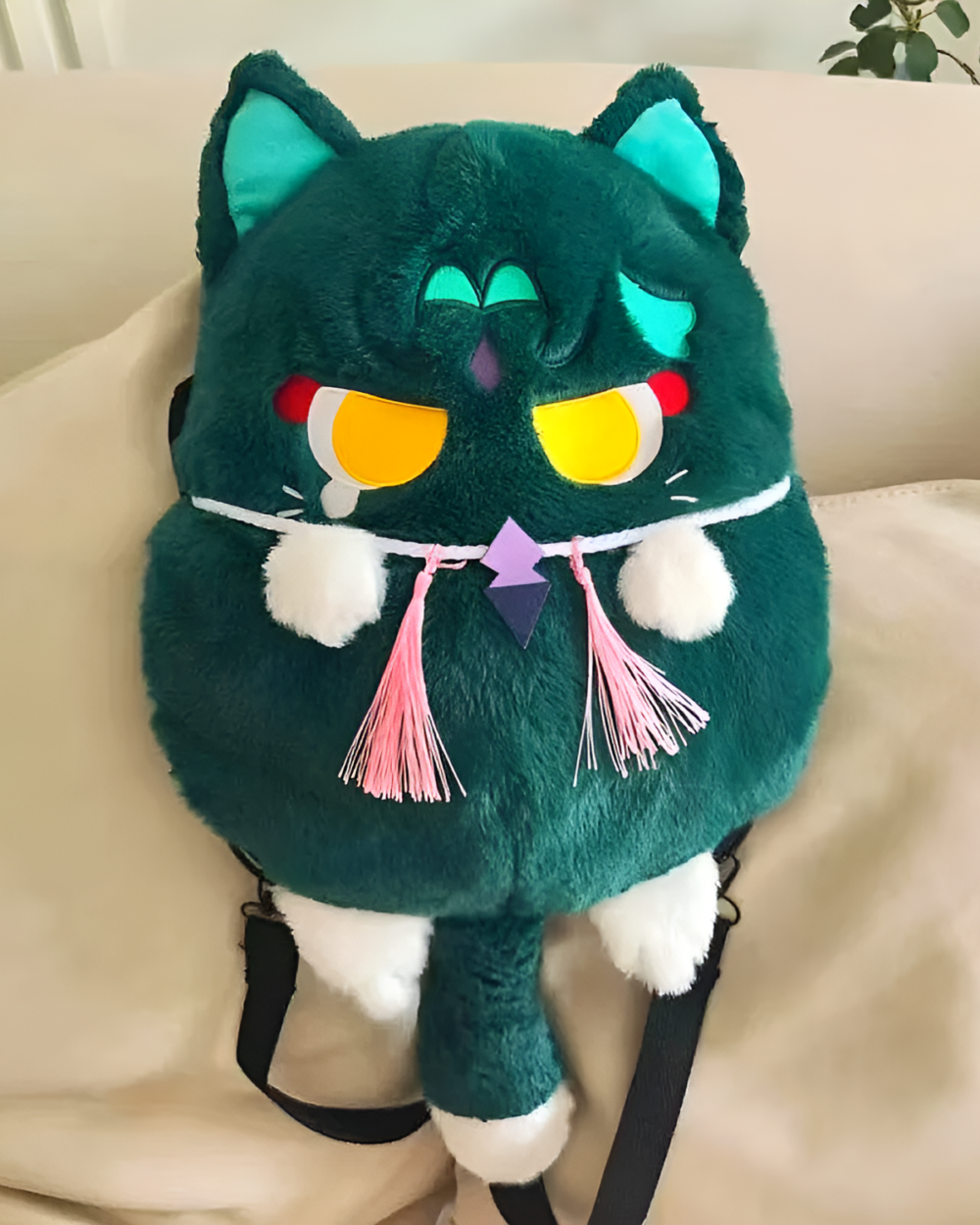 Green ScaraMeow & XiaoMeow backpack, a cute kawaii plush backpack featuring a cat design with decorative tassels.