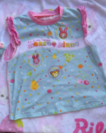 Blue sleeveless Mezzo Piano top with fruit and animal embroidery. A cute Mezzo Piano top for girls.