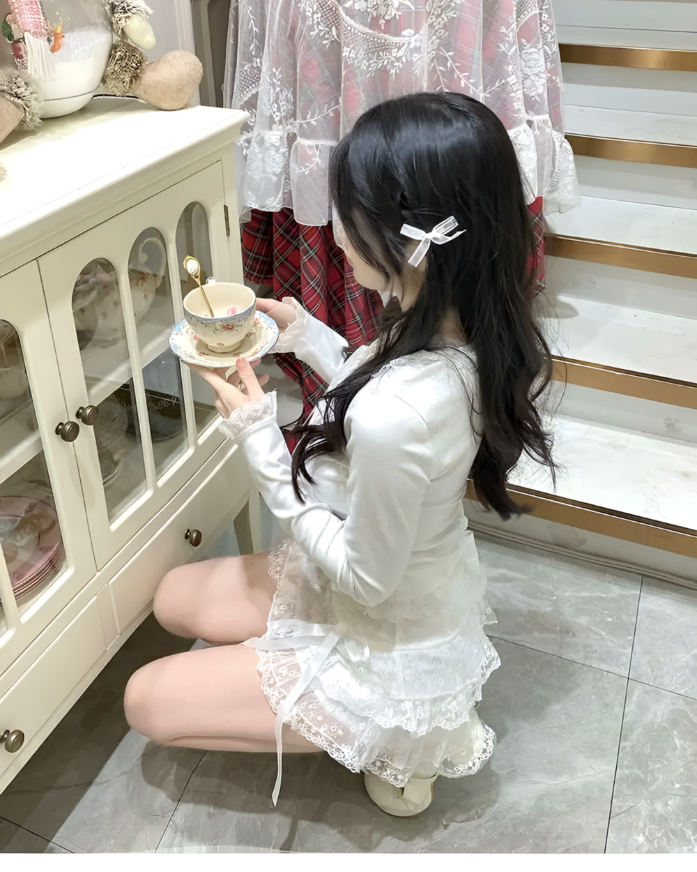 Soft Girl Laced Skirt shown on a model, featuring a white top and delicate lace skirt.